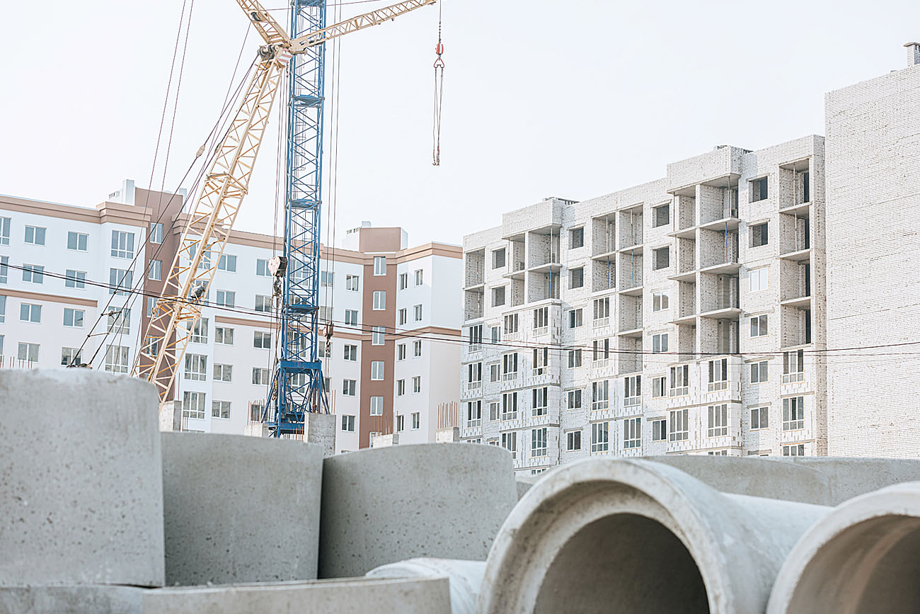 Concrete materials with construction site background