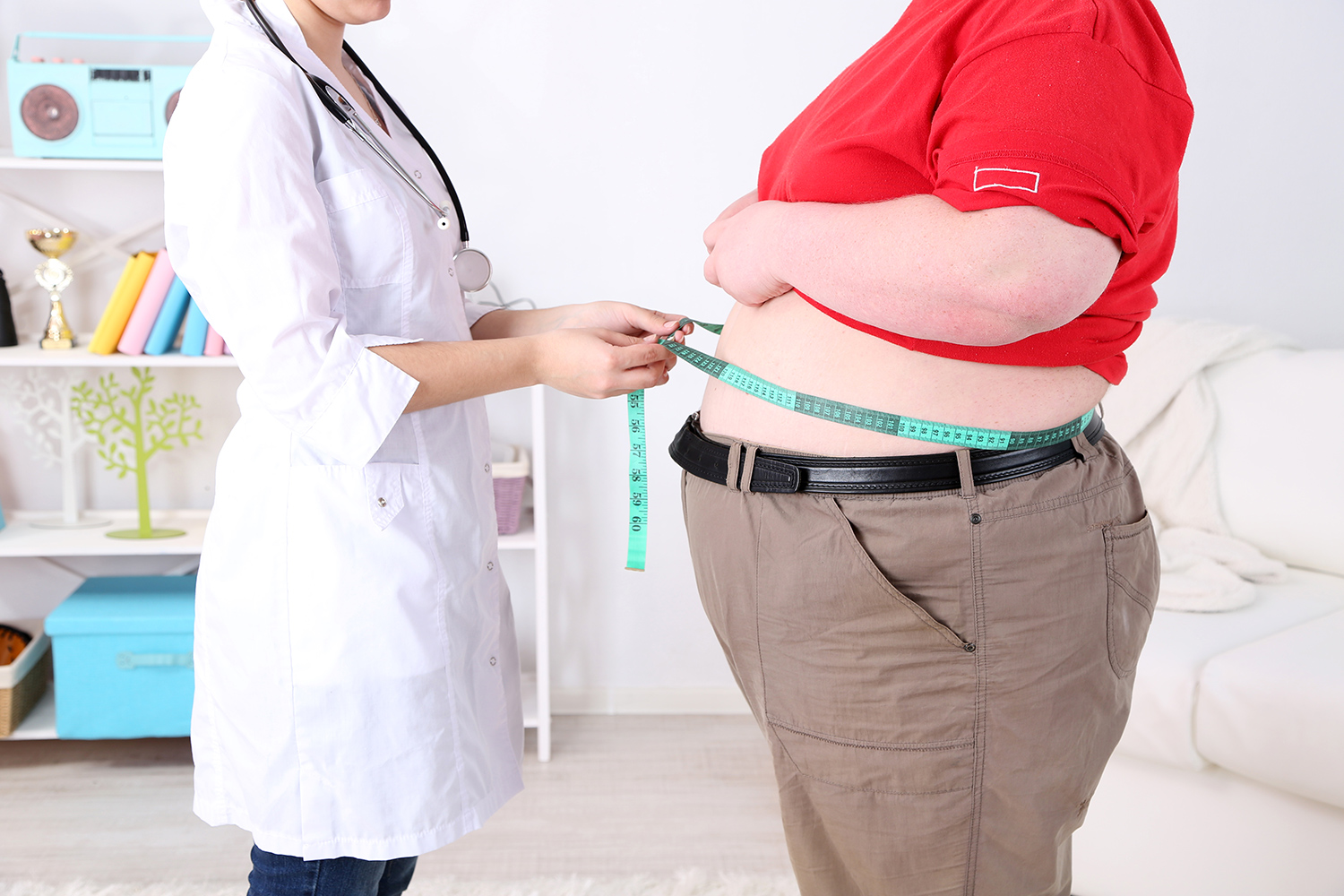 Doctor Examining Obese Patient.