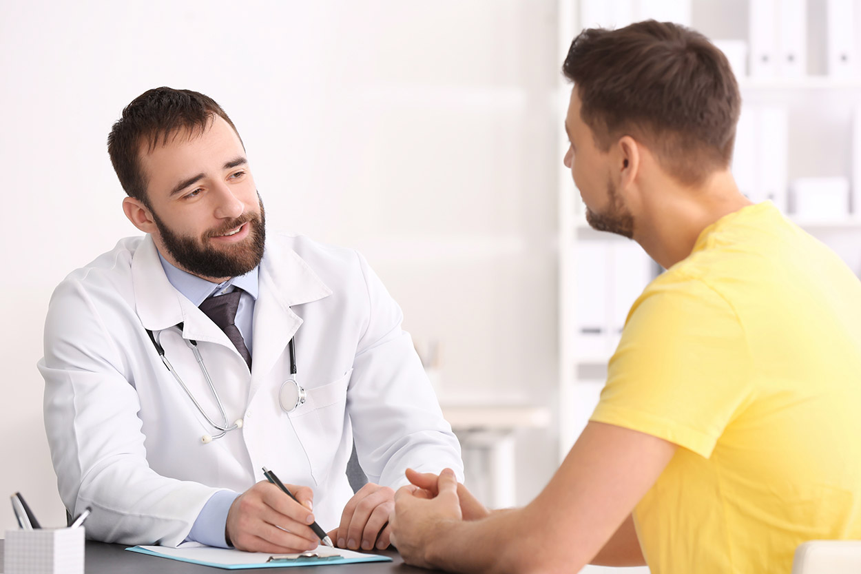 Man consulting a doctor