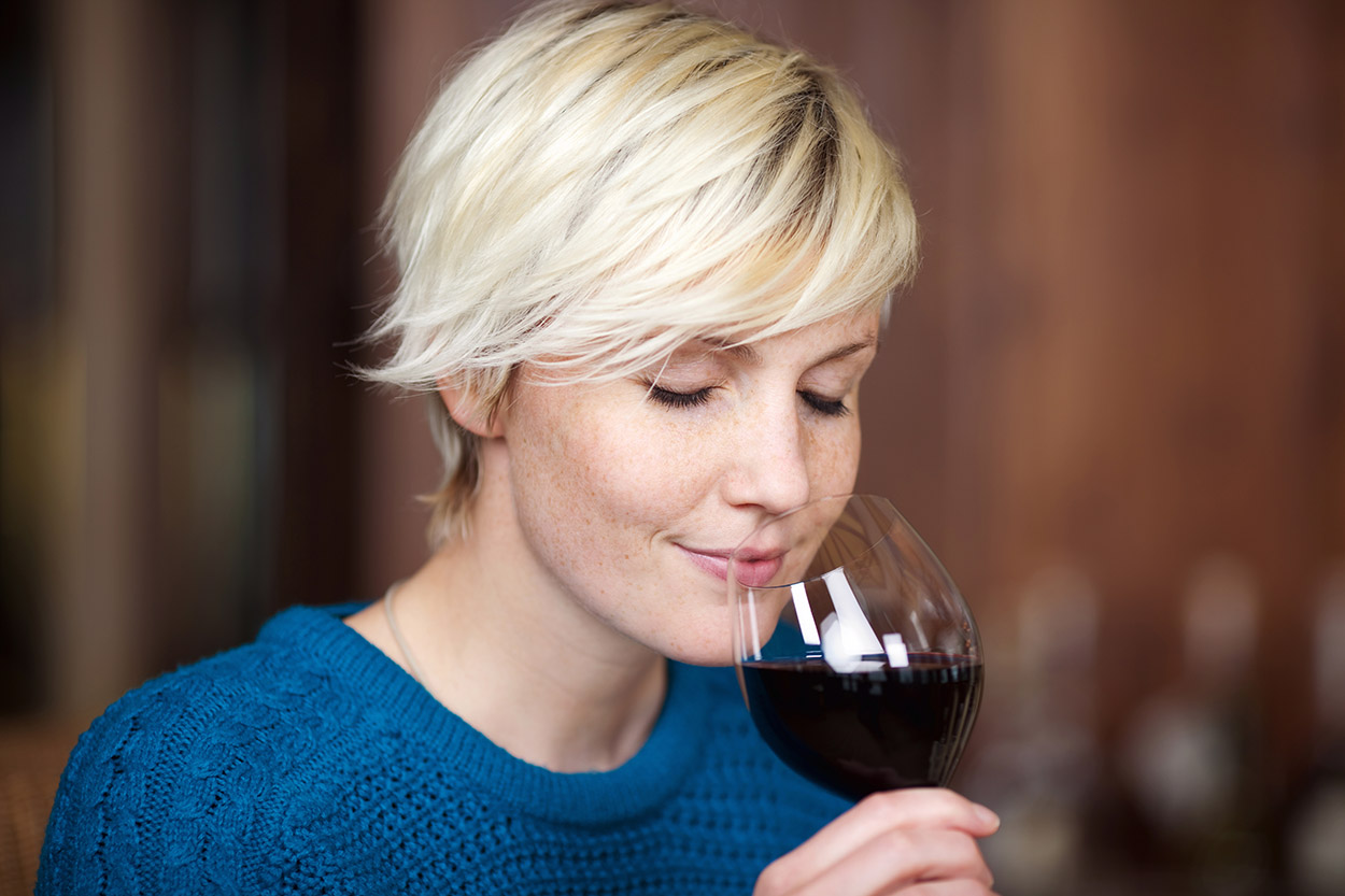 Woman drinking a glass of wine